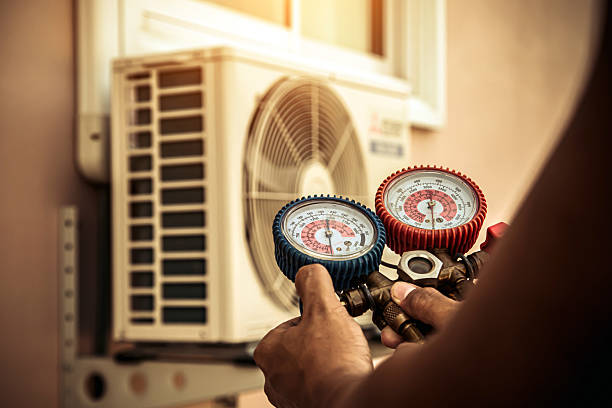 Professional Ac Installation technician working in Bogota, TN